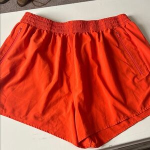 Outdoor Voices Bright Orange Athletic Shorts with Zipper Pockets